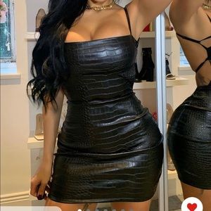 Faux Leather mini dress. Size Large. Brand ( Fashion Nova )
